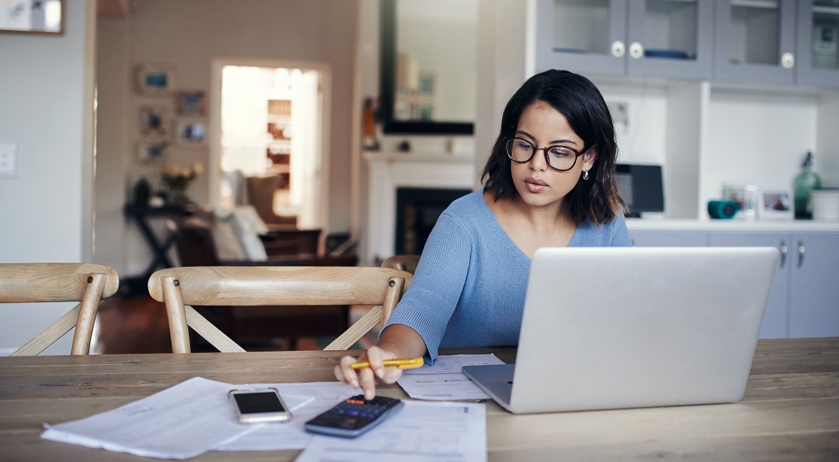 Woman calculating budget