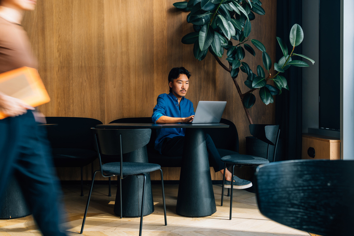 man in a coffee shop, office insurance for lawyers canada