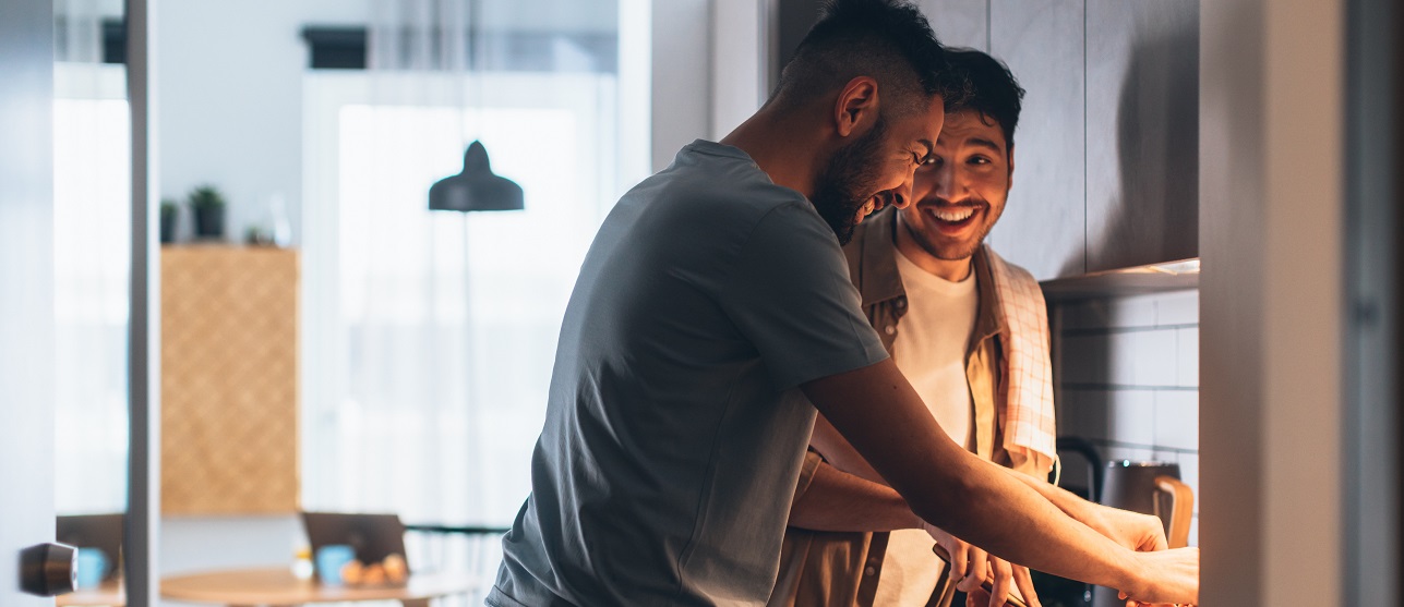 Two men cooking