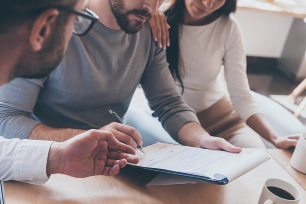 couple talking with a financial advisor