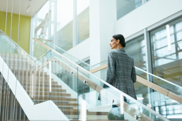 Woman going up the stairs