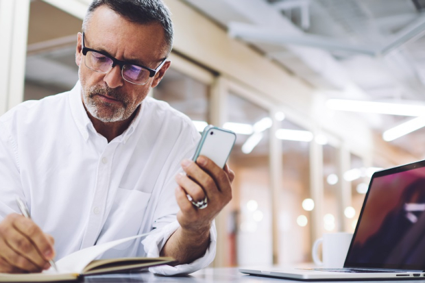 Man working on phone