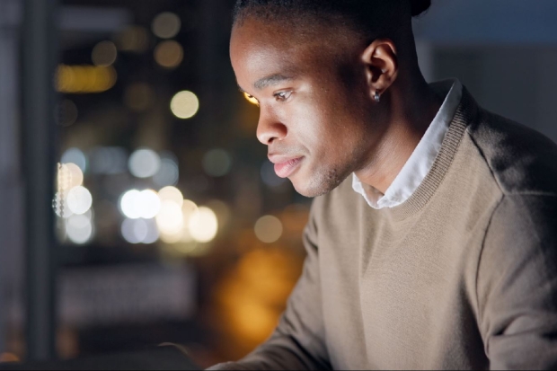 Man working late on his laptop