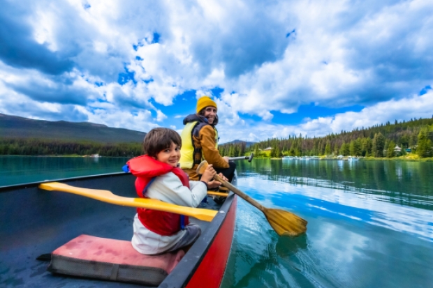 family kayaking in banff canada travel insurance for lawyers