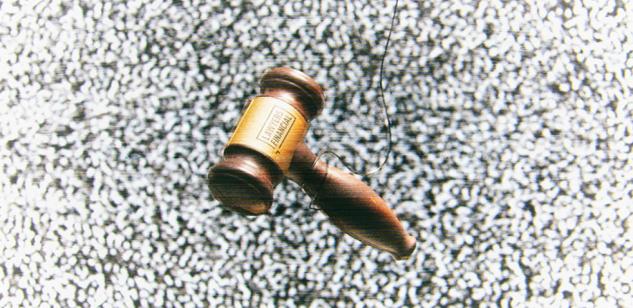 Gavel hanging from string