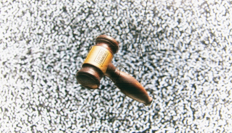 Gavel hanging from string